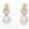 Round pearl and diamonds