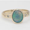 Opal and diamond ring