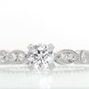 Diamond solitaire engagment ring with Marquise band