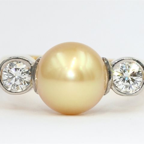 Yellow pearl and diamond ring