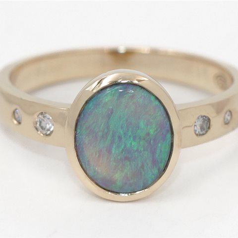 Opal and diamond ring