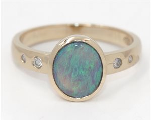 Opal and diamond ring